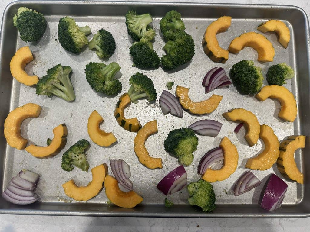 sheet pan with delicata squash, broccoli, red onion