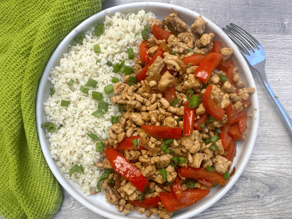 ground turkey stir fry with red bell pepper, onions and cauliflower rice.